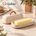 Qsdoia™ Covered Butter Dish with Terracotta-Tone Handle — featured product view with Qsdoia logo